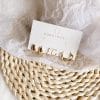 Metal wind twist ring multi piece set of small earrings