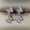 Bow-set diamond earrings