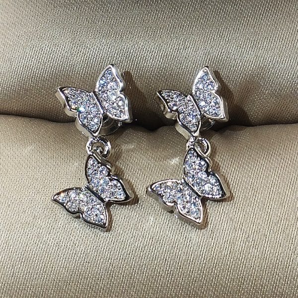 Bow-set diamond earrings