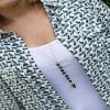 Volcanic stone arrow sweater necklace