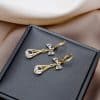 Women's Hollow Drop Zircon Bow Earrings