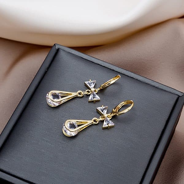 Women's Hollow Drop Zircon Bow Earrings