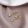 Women's Hollow Drop Zircon Bow Earrings