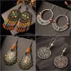 Drop-shaped alloy pendant earrings