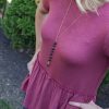 Volcanic stone arrow sweater necklace