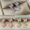 Bow-set diamond earrings