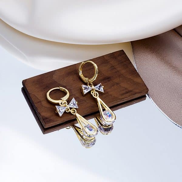 Women's Hollow Drop Zircon Bow Earrings